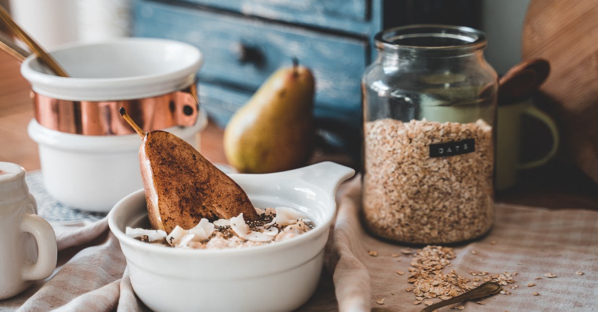 Something came out of oats. What's this? - White Ceramic Bowl With Brown Powder Beside Brown Bread Something came out of oats. What's this? - White Ceramic Bowl With Brown Powder Beside Brown Bread