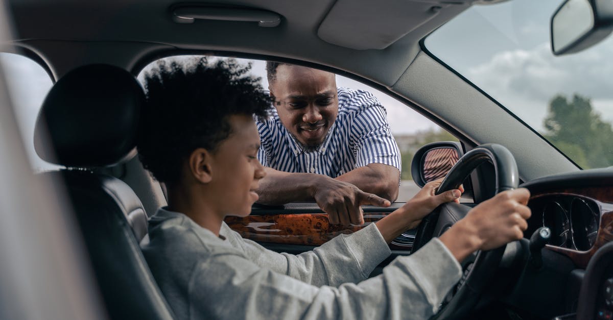Soufflé the day before? - Man in Blue and White Striped Dress Shirt Sitting on Car Seat Soufflé the day before? - Man in Blue and White Striped Dress Shirt Sitting on Car Seat