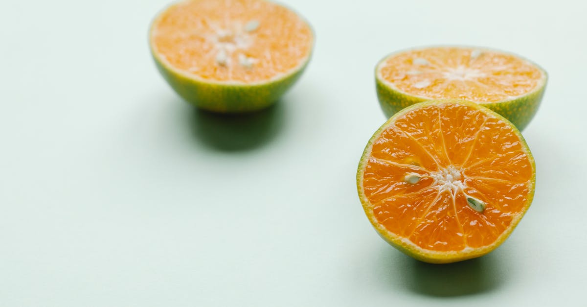 Sour Almonds use - Halves of whole oranges for healthy tropical meal Sour Almonds use - Halves of whole oranges for healthy tropical meal