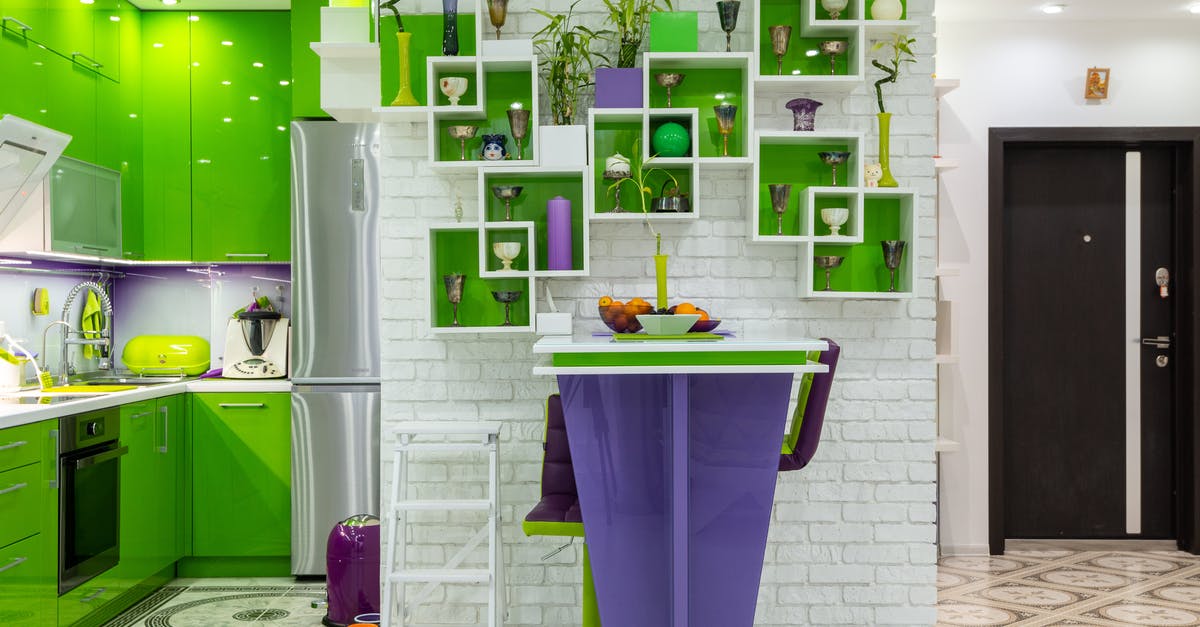 Soy milk; fridge vs. shelf? - Creative shelves decorated with various vases and plants hanging on white brick wall above counter in contemporary kitchen with bright green and purple furniture Soy milk; fridge vs. shelf? - Creative shelves decorated with various vases and plants hanging on white brick wall above counter in contemporary kitchen with bright green and purple furniture