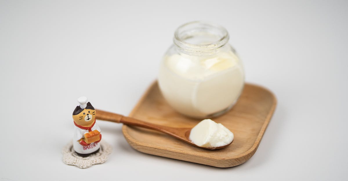 soy milk production with no beany flavor - Vietnamese coffee maker on ceramic bowl placed on table