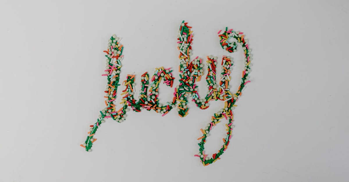Sprinkle colors that bleed into icing - Green Icing Text With Colorful Sprinkles Sprinkle colors that bleed into icing - Green Icing Text With Colorful Sprinkles