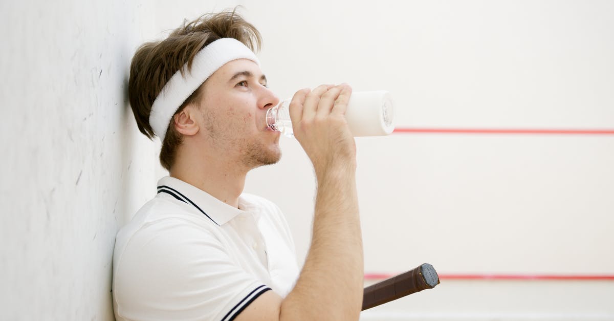 Squash Casserole: Reducing the water content? - Side View of a Squash Player Drinking Water Squash Casserole: Reducing the water content? - Side View of a Squash Player Drinking Water