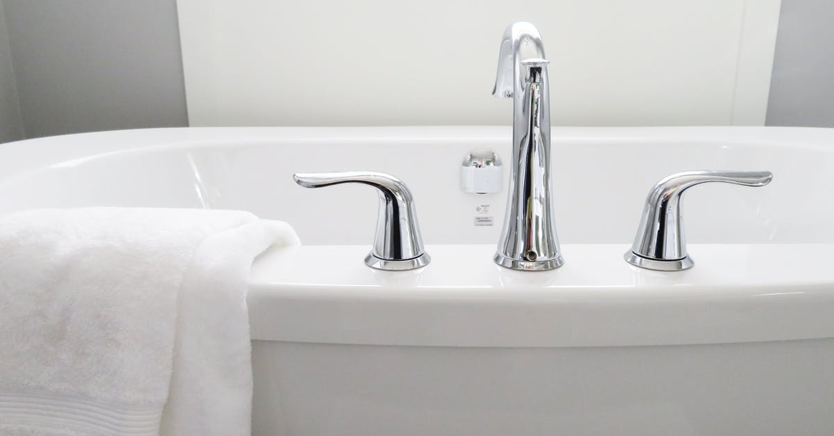 Stainless vs Enameled Porcelain Grates? - Towel Hanged on Bathtub Stainless vs Enameled Porcelain Grates? - Towel Hanged on Bathtub
