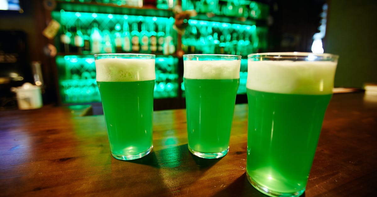 Stockpot double as beer brewing pot - Drinking Glass With Green Liquid