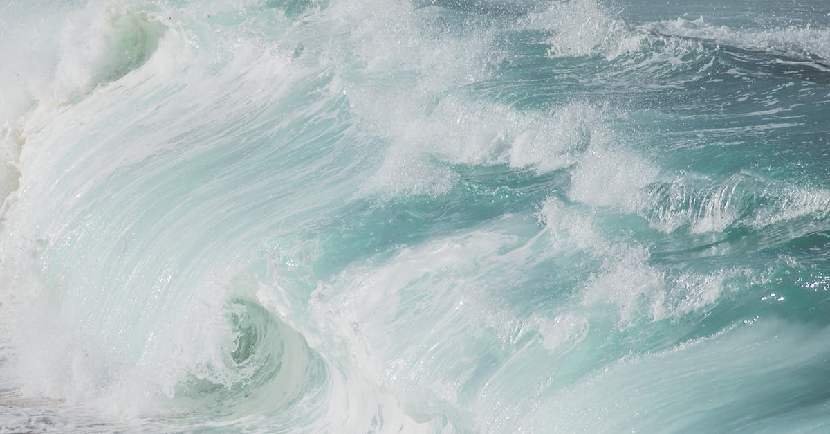 Stop my pot splashing me - A Close-up Shot of Sea Waves Stop my pot splashing me - A Close-up Shot of Sea Waves