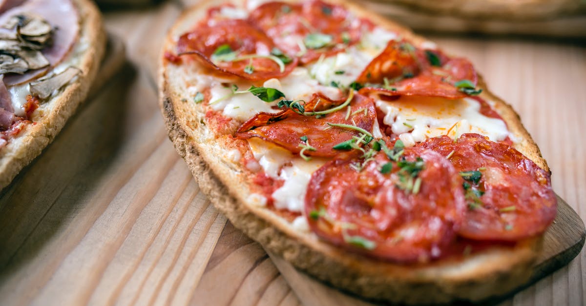 Storage of cheese starter cultures - Tasty toast with pepperoni slices on cutting board