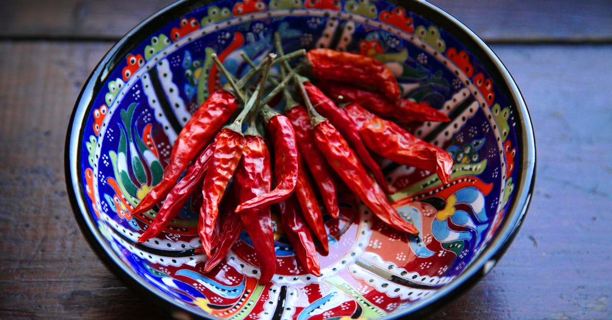 Storing dried peppers - Red Chilies on Blue Ceramic Bowl Storing dried peppers - Red Chilies on Blue Ceramic Bowl