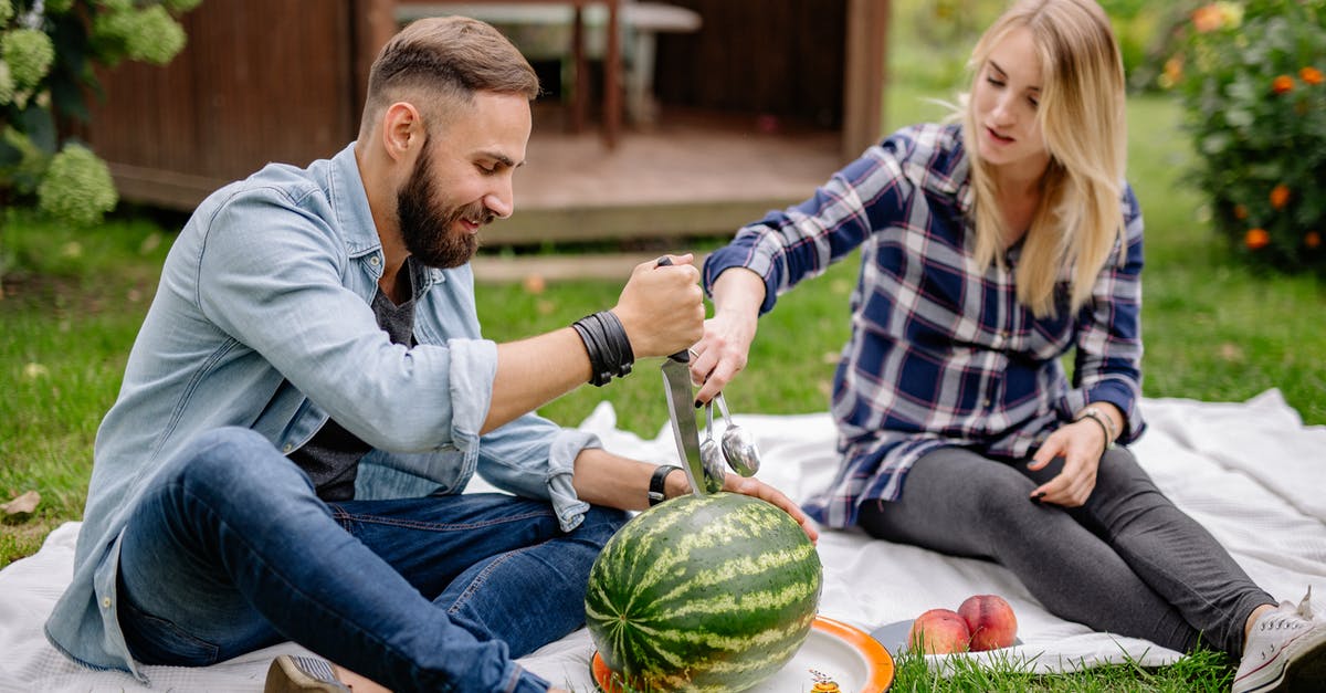 Storing fresh peaches for a long time - A Man Slicing a Watermelon Storing fresh peaches for a long time - A Man Slicing a Watermelon