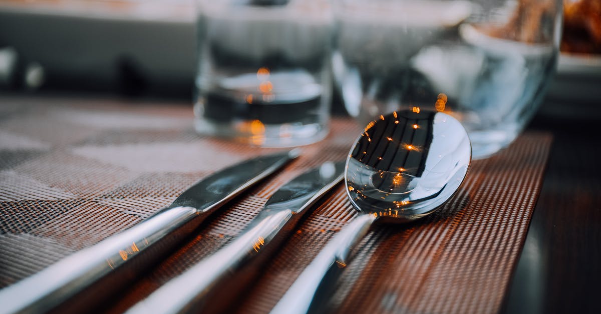 Storing knives in knife sheaths - Close-Up Photo of Silverware Storing knives in knife sheaths - Close-Up Photo of Silverware