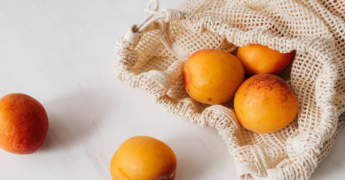 Storing peaches - Orange Fruit on White Marble Storing peaches - Orange Fruit on White Marble