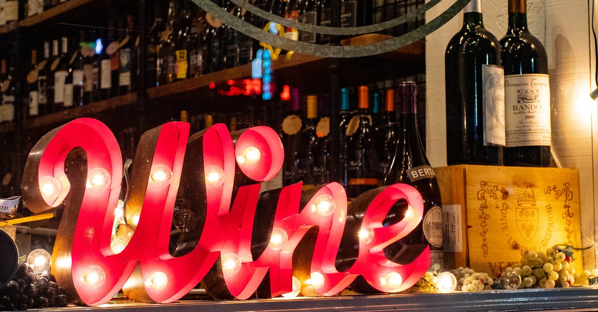 Storing sourdough starters with wine in a wine fridge? - Red Wine Marquee Signage on Table Storing sourdough starters with wine in a wine fridge? - Red Wine Marquee Signage on Table