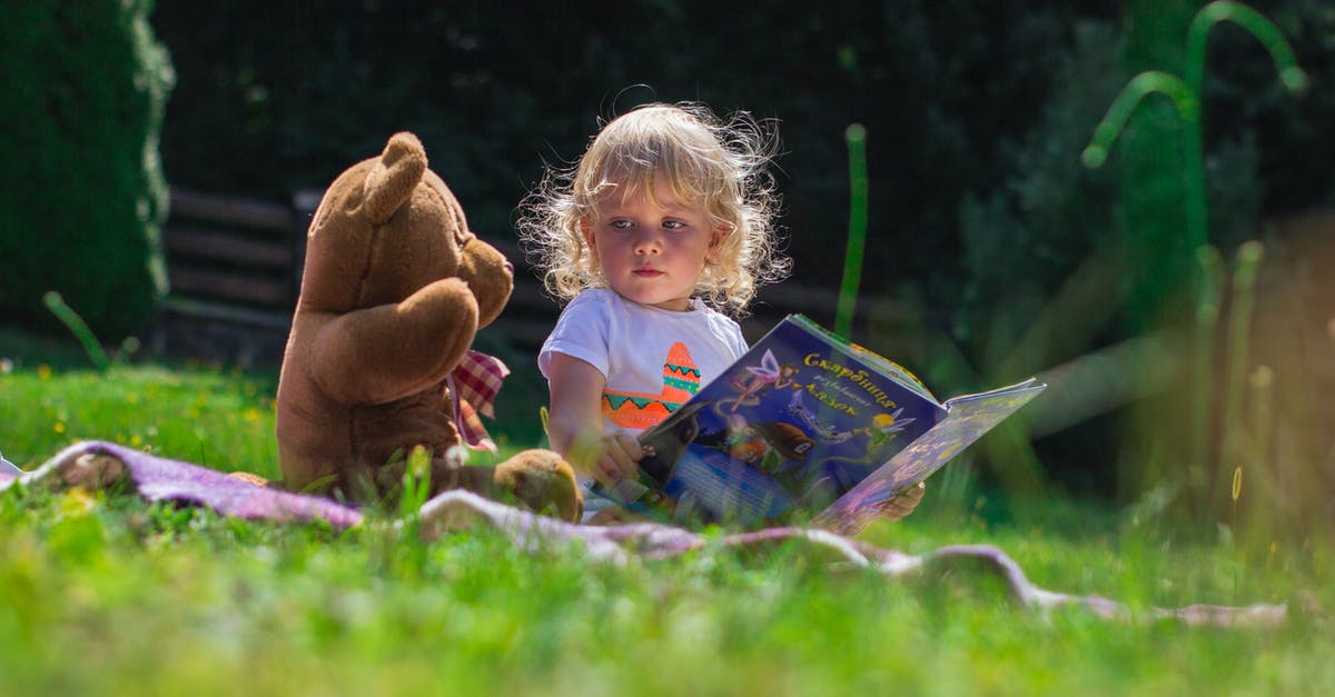 Stuffing bread for the next day - Girl Sitting Beside A Teddy Bear Stuffing bread for the next day - Girl Sitting Beside A Teddy Bear