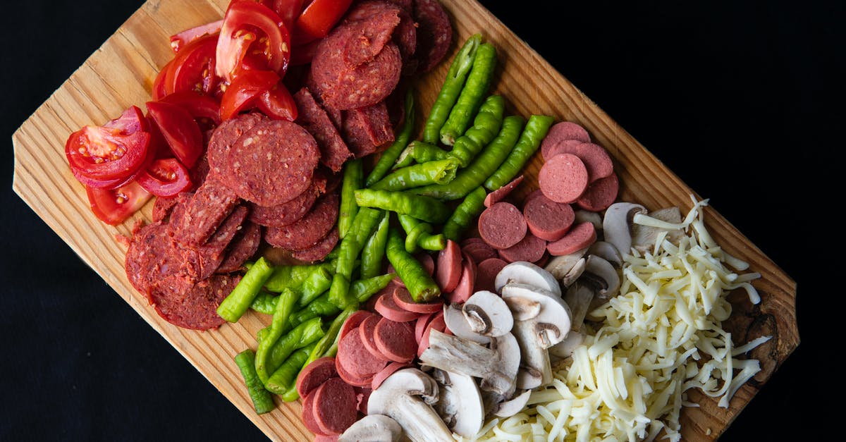 Substitute Cayenne Pepper for Black Pepper - Sliced ingredients on cutting board Substitute Cayenne Pepper for Black Pepper - Sliced ingredients on cutting board
