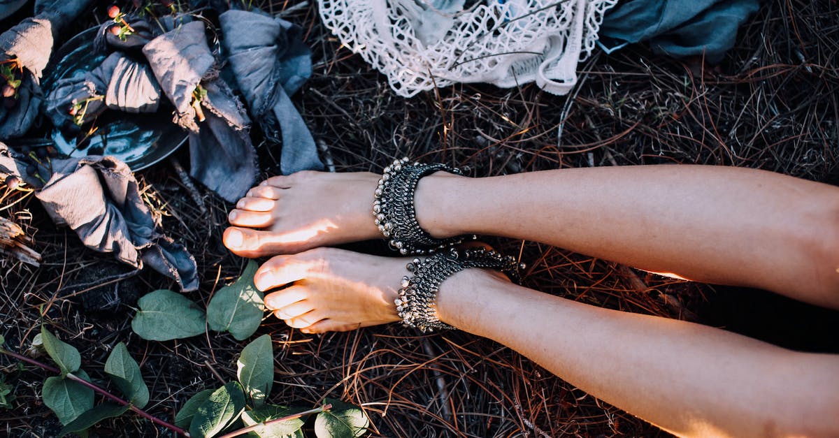Substitute for ground picnic ham. - Crop barefoot woman on nature Substitute for ground picnic ham. - Crop barefoot woman on nature