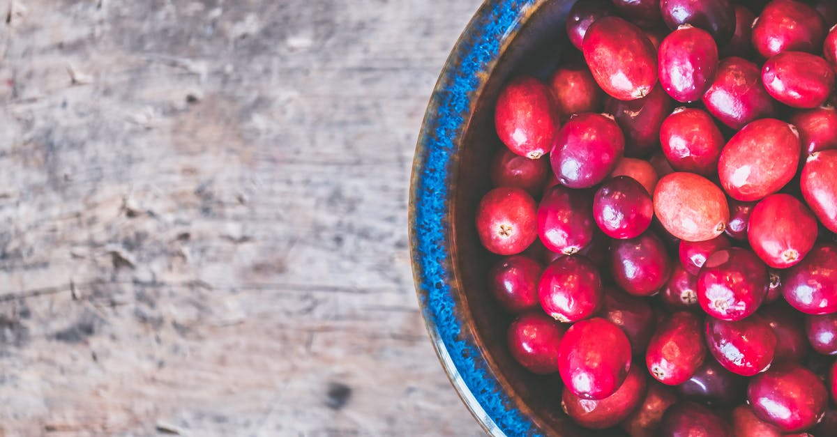 Substitute frozen cranberries for fresh berries - Bowl of Red Round Fruits Substitute frozen cranberries for fresh berries - Bowl of Red Round Fruits