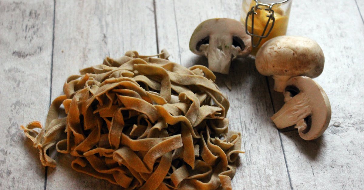 Substituting barley for pasta - Brown Mushrooms on White Wooden Table Substituting barley for pasta - Brown Mushrooms on White Wooden Table