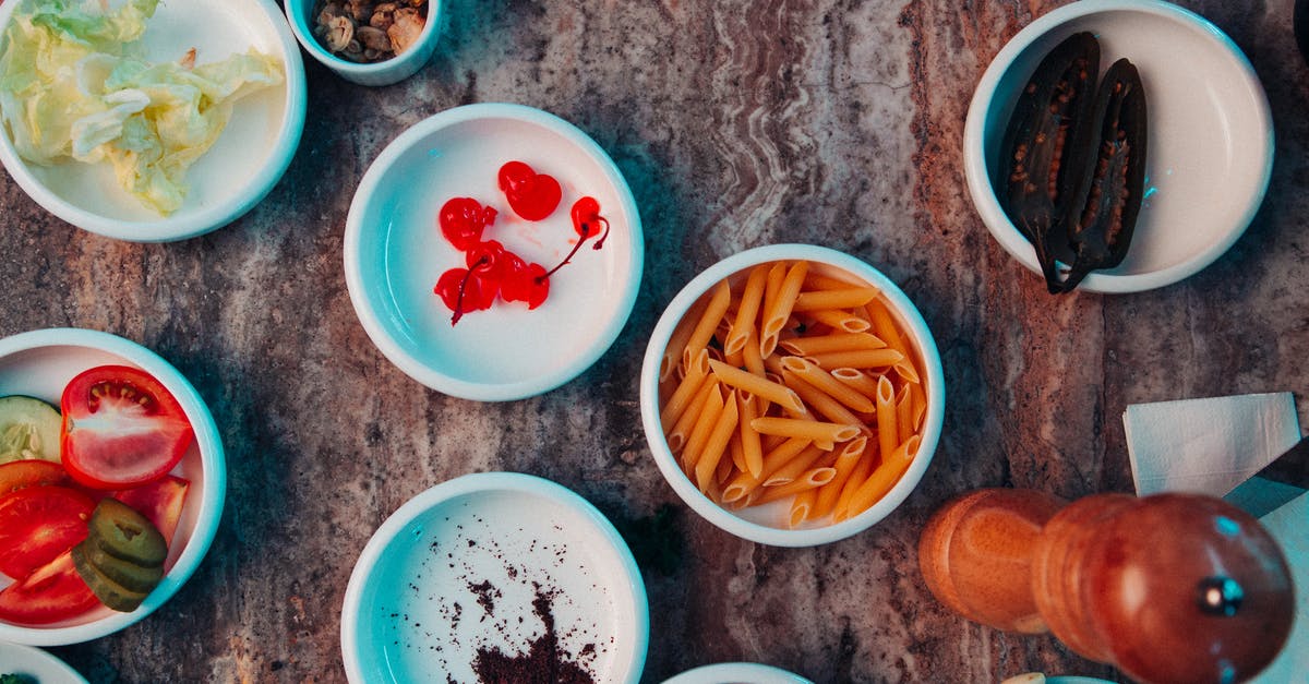 Substituting garlic powder for garlic salt? - Ingredients in bowls for tasty pasta Substituting garlic powder for garlic salt? - Ingredients in bowls for tasty pasta