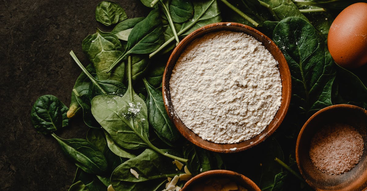 Substituting hazelnuts for almonds, baking - White Flour in the Wooden Bowl on the Green Leaves Substituting hazelnuts for almonds, baking - White Flour in the Wooden Bowl on the Green Leaves