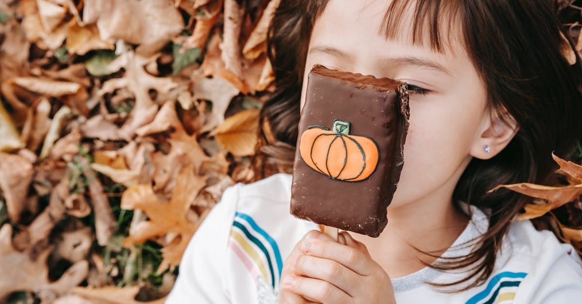 Substituting white chocolate in Julia Child's mousse - Little girl with Halloween gingerbread Substituting white chocolate in Julia Child's mousse - Little girl with Halloween gingerbread