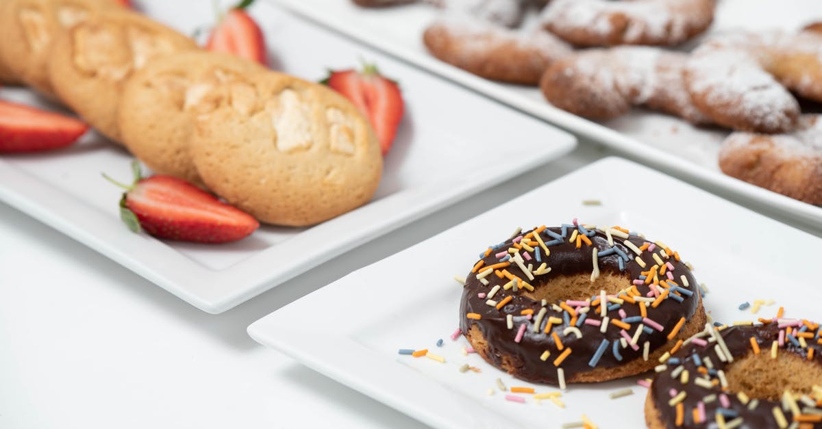 Substitution for hagelslag (chocolate sprinkles for bread) - Chocolate Doughnuts with Sprinkles on a Plate Beside Cookies with Strawberries Substitution for hagelslag (chocolate sprinkles for bread) - Chocolate Doughnuts with Sprinkles on a Plate Beside Cookies with Strawberries