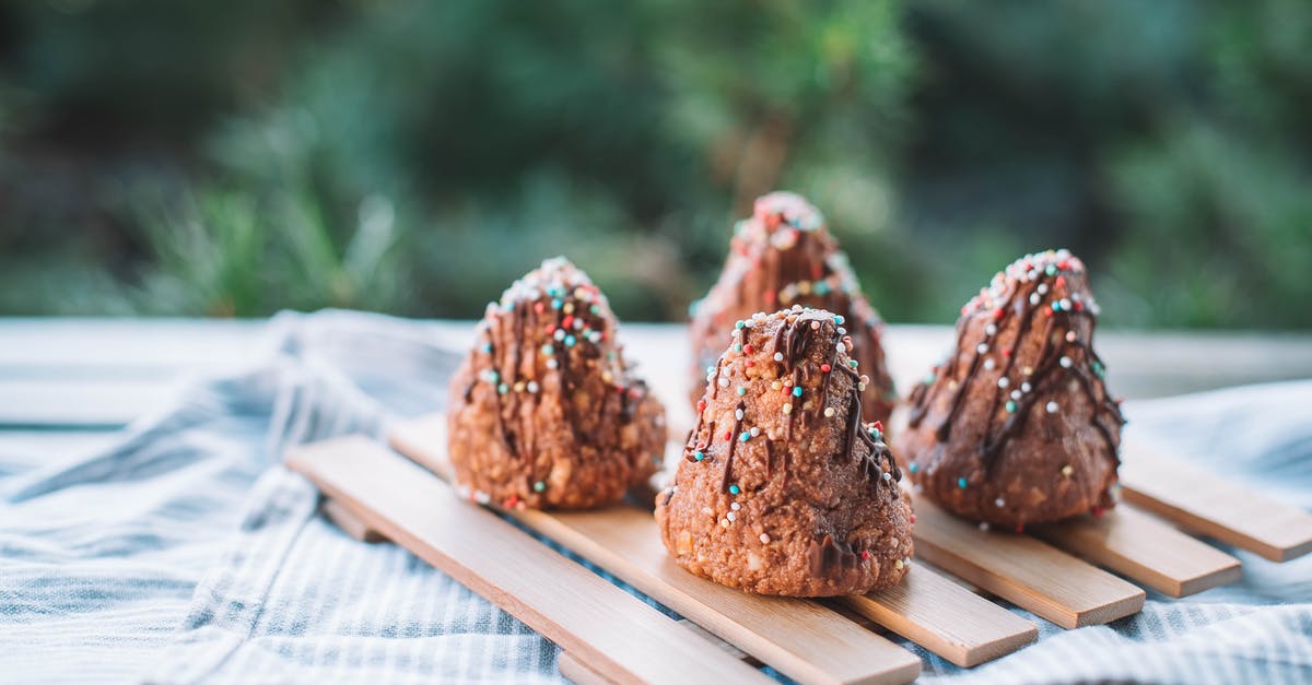 Substitution for hagelslag (chocolate sprinkles for bread) - Brown Cookies on Brown Wooden Tray Substitution for hagelslag (chocolate sprinkles for bread) - Brown Cookies on Brown Wooden Tray
