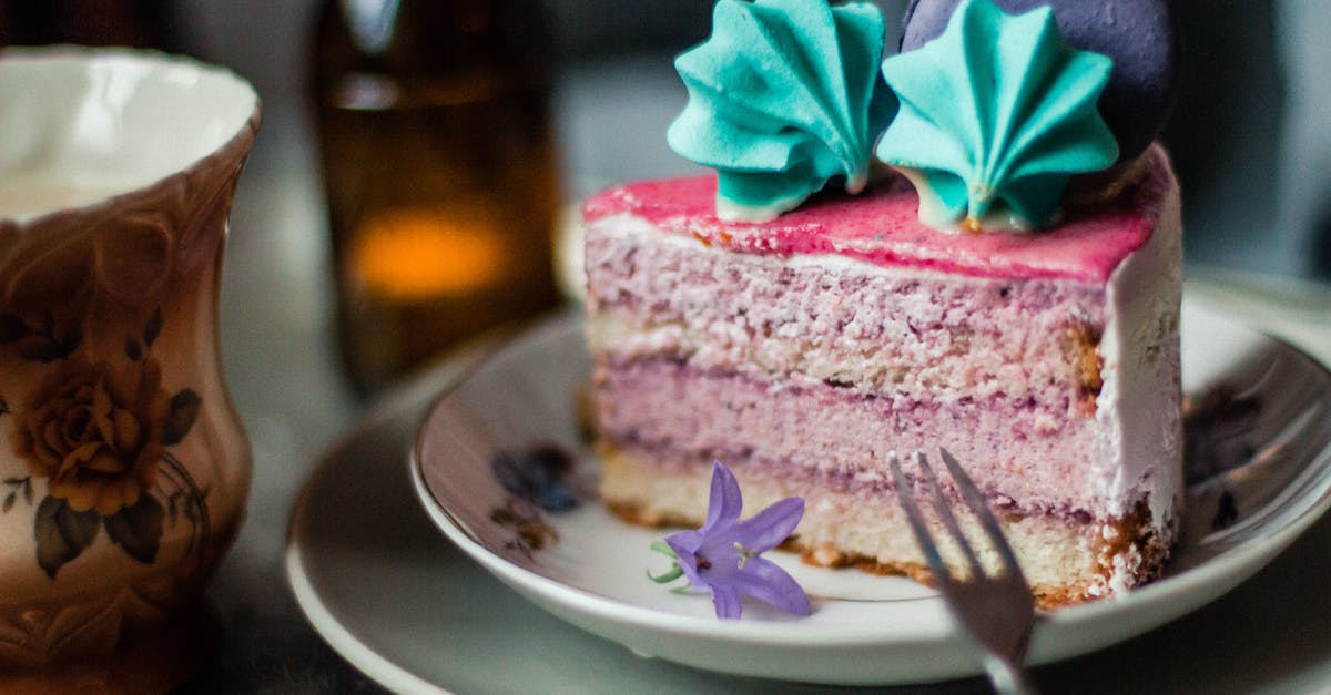 Sugar/salt frosted around the top of a cup/mug - Piece of pink cake with meringues and macaron Sugar/salt frosted around the top of a cup/mug - Piece of pink cake with meringues and macaron