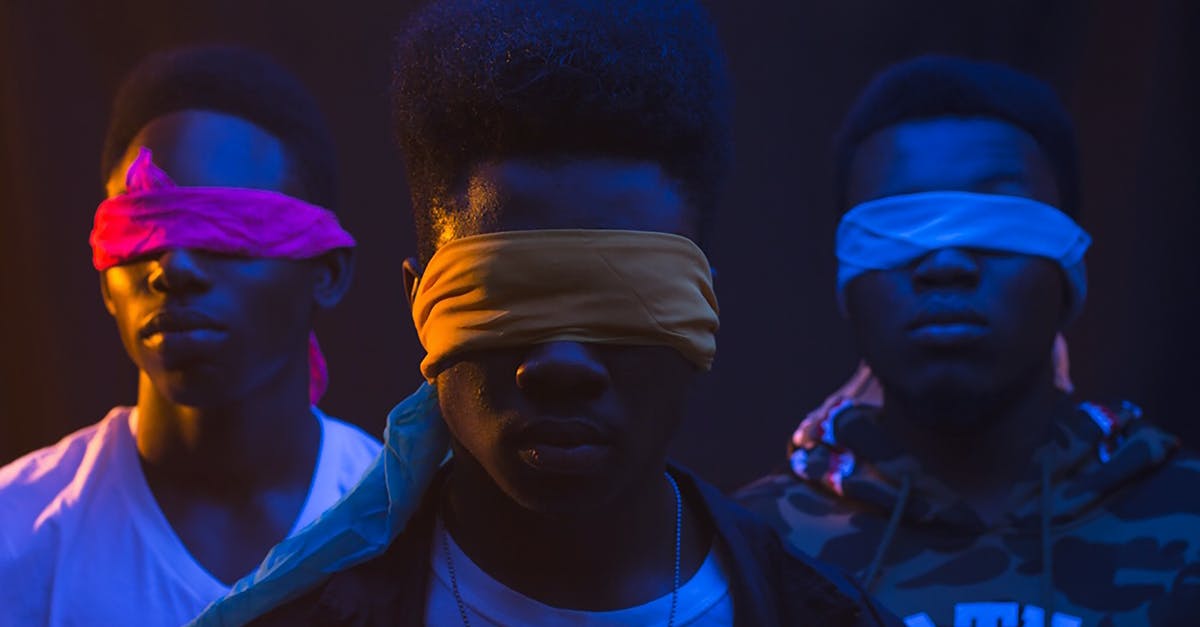 Super soft fried shrimp in a light batter - Anonymous cool ethnic male band with Afro hairstyle and covered eyes illuminated by artificial light Super soft fried shrimp in a light batter - Anonymous cool ethnic male band with Afro hairstyle and covered eyes illuminated by artificial light