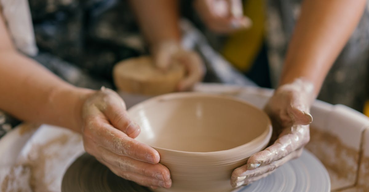 Taiyaki not forming correctly - Person Shaping the Clay Using Hands Taiyaki not forming correctly - Person Shaping the Clay Using Hands