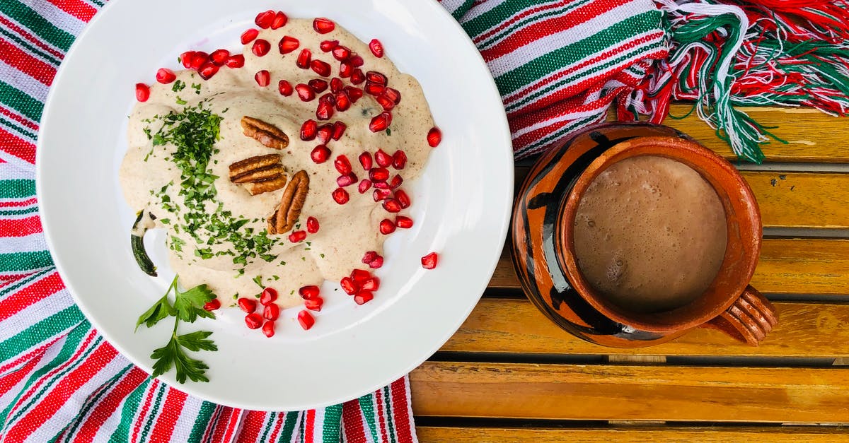 Tarragon: French vs Russian vs Mexican - Brown Bread on White and Blue Floral Ceramic Plate Tarragon: French vs Russian vs Mexican - Brown Bread on White and Blue Floral Ceramic Plate