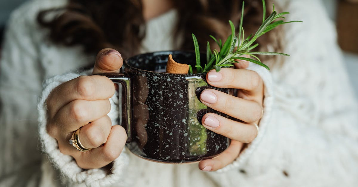 Tea cup residue - Person Holding Black and Brown Ceramic Mug Tea cup residue - Person Holding Black and Brown Ceramic Mug