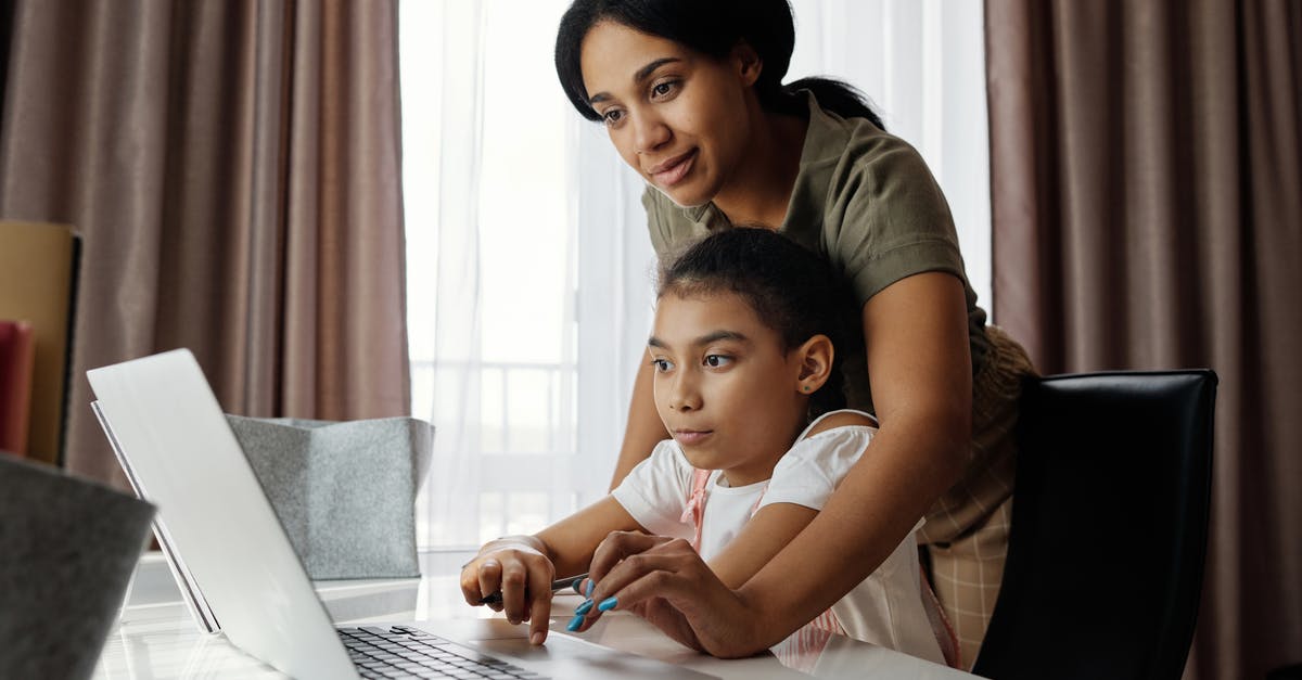 Teaching Bread Making to a young student- need new reasources [closed] - Mother Helping her Daughter use a Laptop