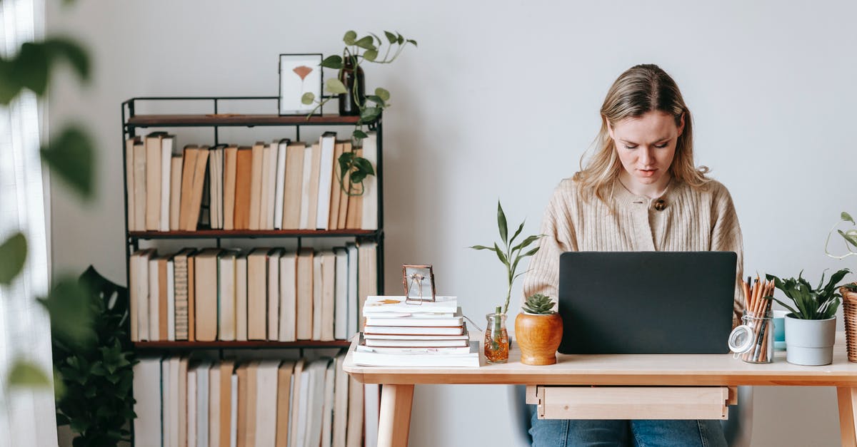 Techniques for using (Polish) Pickle Pots? - Concentrated freelancer working on laptop at home desk