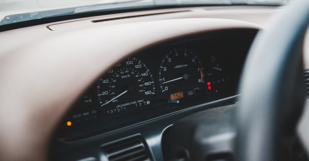 Temperature controlled work surface? - Closeup of control panel of modern expensive automobile with indicators on wide dashboard in soft focus Temperature controlled work surface? - Closeup of control panel of modern expensive automobile with indicators on wide dashboard in soft focus