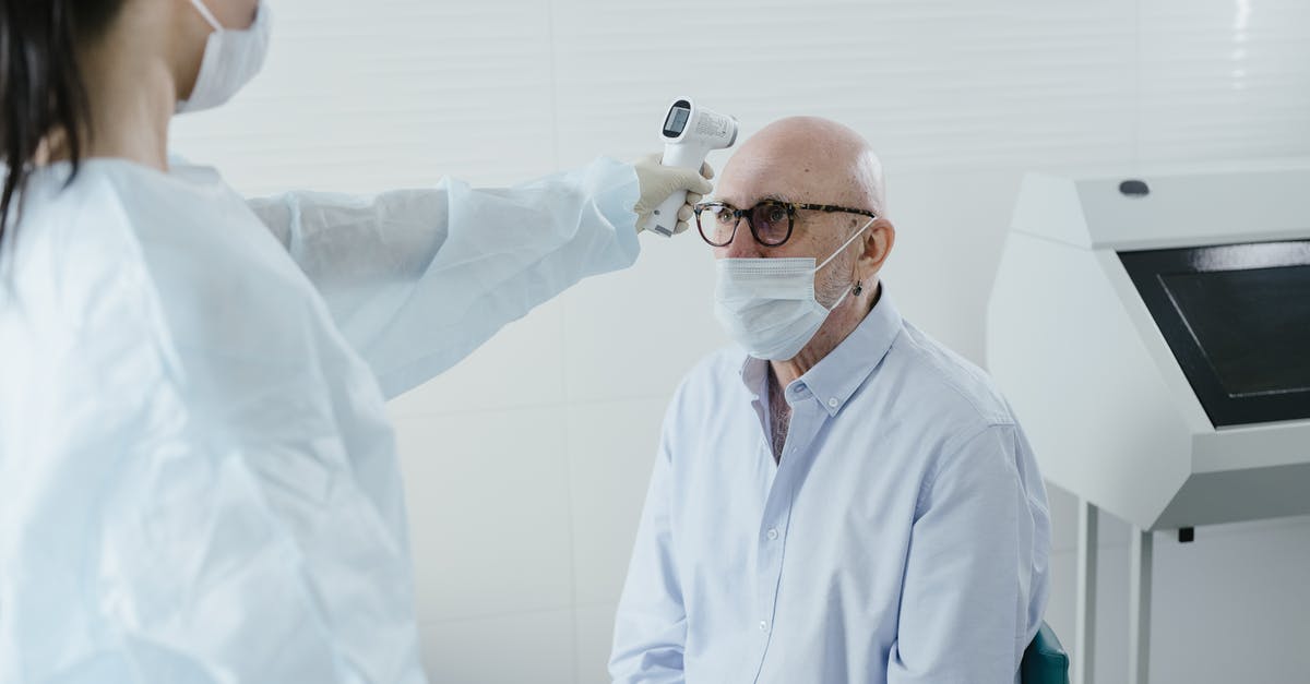 Temperature needed to make crunchy toffee - A Medical Professional Taking the Temperature of a Patient Temperature needed to make crunchy toffee - A Medical Professional Taking the Temperature of a Patient