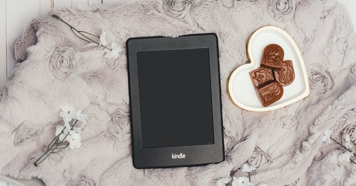 Tempered chocolate spheres in advance? - Photo Of Black Kindle Tablet Beside Bowl Of Choclates Tempered chocolate spheres in advance? - Photo Of Black Kindle Tablet Beside Bowl Of Choclates
