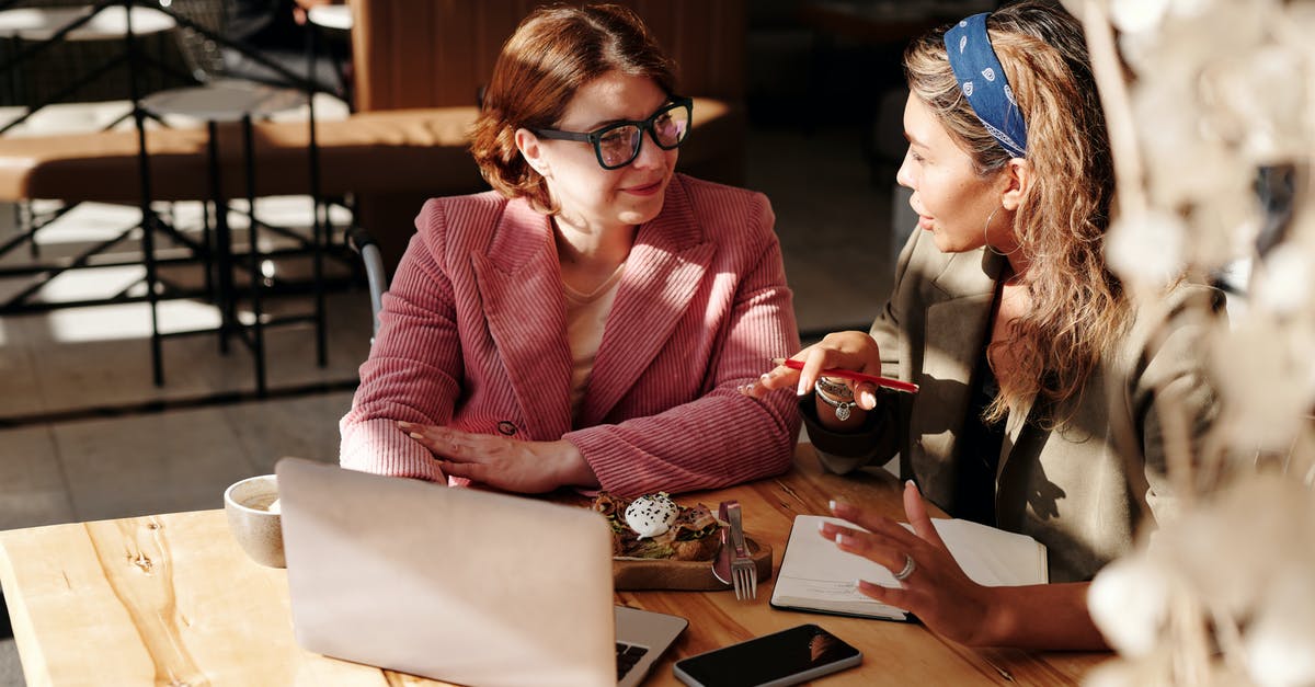 Test if two foods are the same - Woman in Red Blazer Sitting by the Table Having a Meeting Test if two foods are the same - Woman in Red Blazer Sitting by the Table Having a Meeting