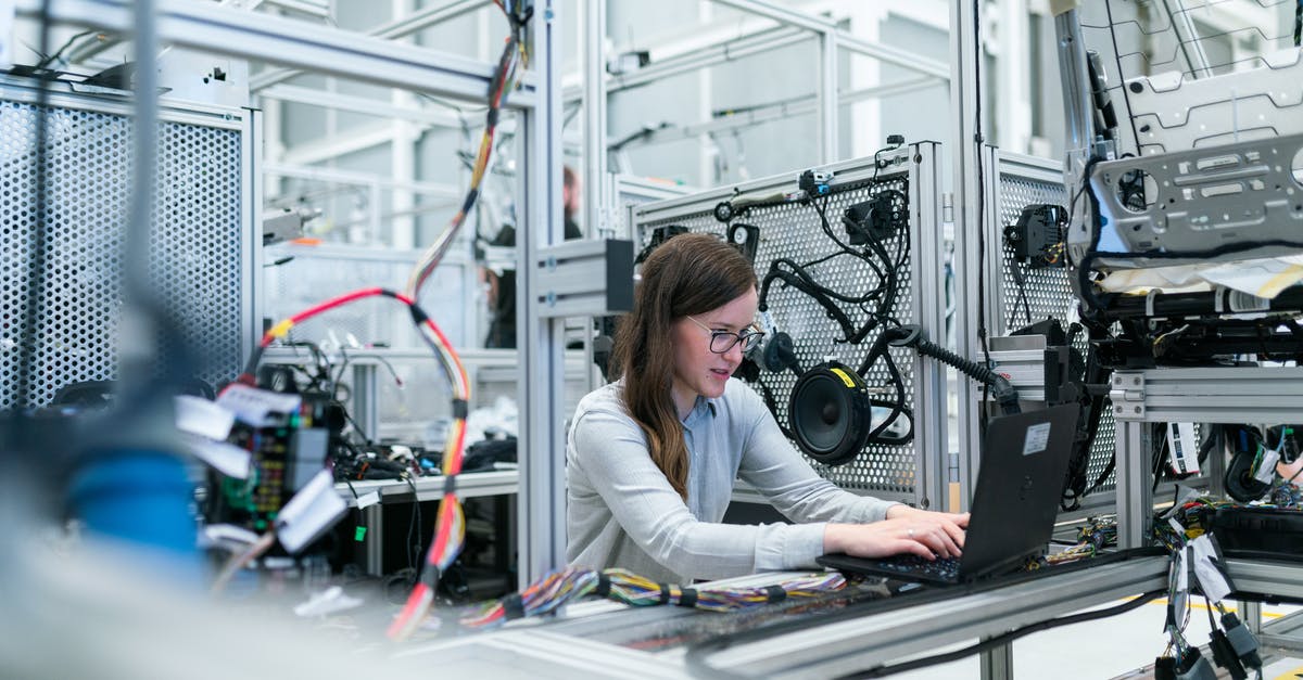 Testing for beef - Photo Of Female Engineer Working On Her Workspace Testing for beef - Photo Of Female Engineer Working On Her Workspace