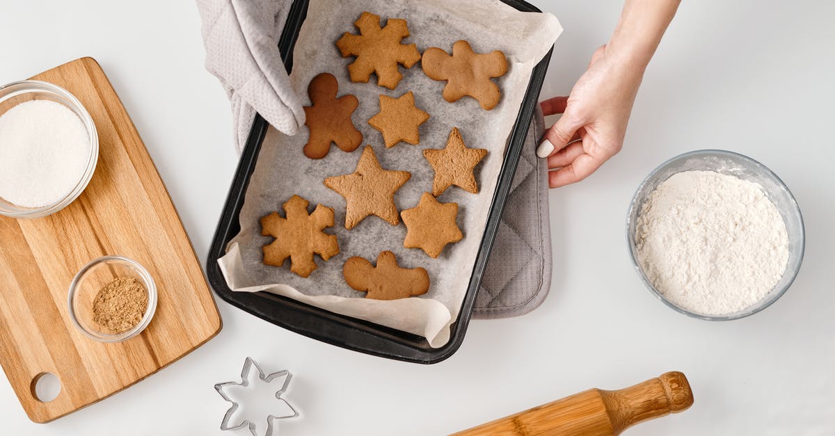 Tips on cooking for people with different allergies - Person Holding a Tray With Different Shapes of Brown Cookies Tips on cooking for people with different allergies - Person Holding a Tray With Different Shapes of Brown Cookies