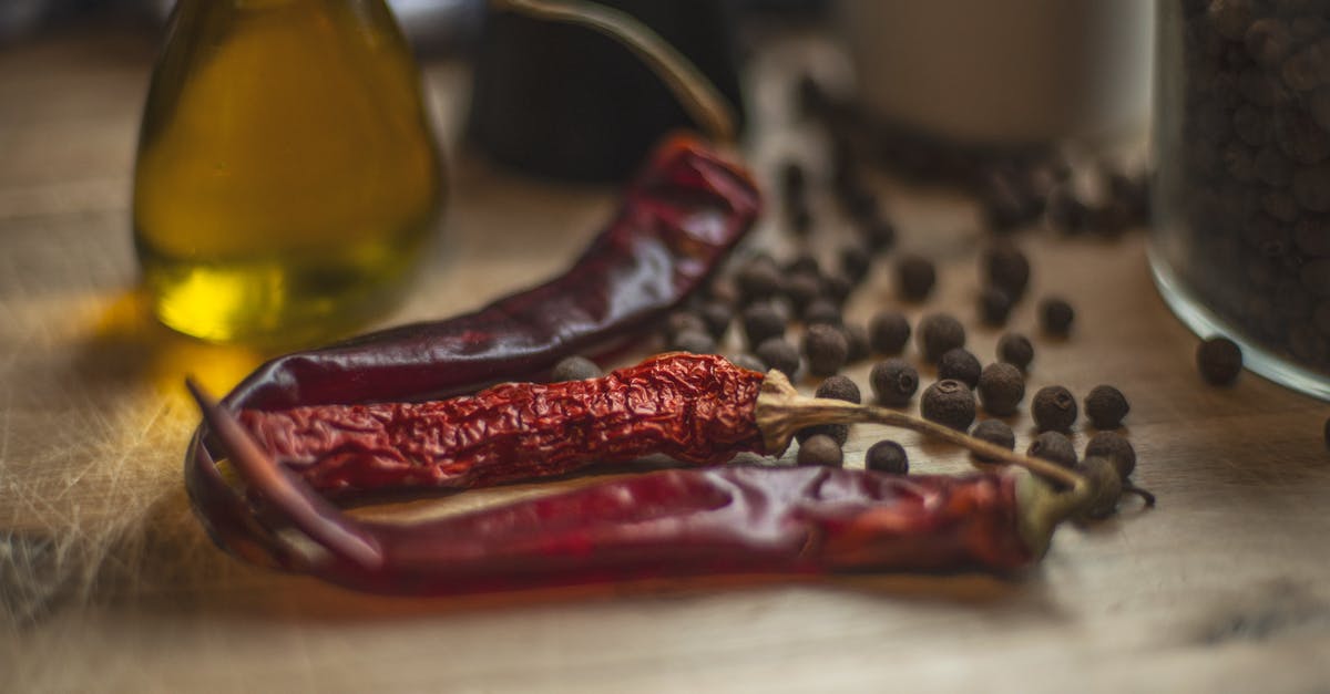 Toasting spices with and without oil - Dried Spices over a Wooden Table
Toasting spices with and without oil - Dried Spices over a Wooden Table