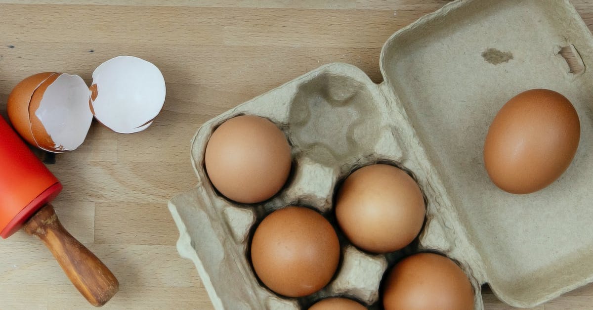 Tomato Products containing Citric Acid - Egg placed on table in kitchen Tomato Products containing Citric Acid - Egg placed on table in kitchen