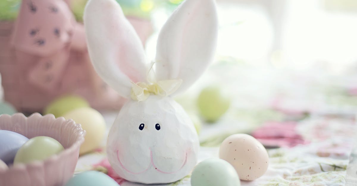 Traditional Easter Turkey - White Rabbit Figurine on White and Pink Floral Textile Traditional Easter Turkey - White Rabbit Figurine on White and Pink Floral Textile