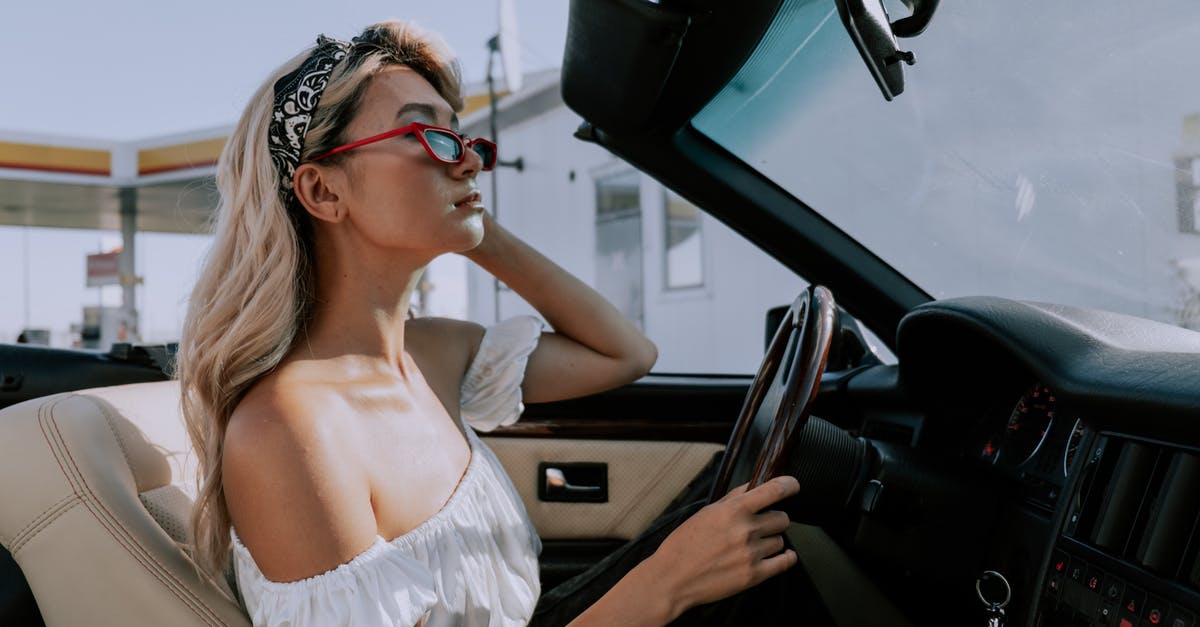 Traveling with sourdough starter - A Woman Looking at Her Reflection on a Rear-view mirror Traveling with sourdough starter - A Woman Looking at Her Reflection on a Rear-view mirror
