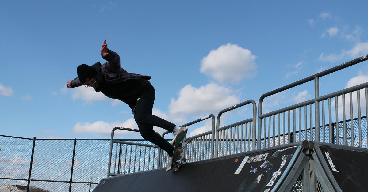 Tricks for knowing when a cheesecake is correctly done [duplicate] - Man in Black Jacket and Black Pants Using Skateboard on Ramp