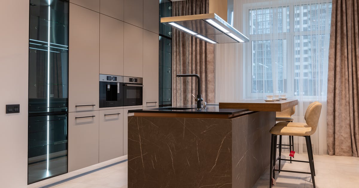 Troubleshooting Soft and Mushy Oven Fries - Interior of modern kitchen with furniture in daytime Troubleshooting Soft and Mushy Oven Fries - Interior of modern kitchen with furniture in daytime