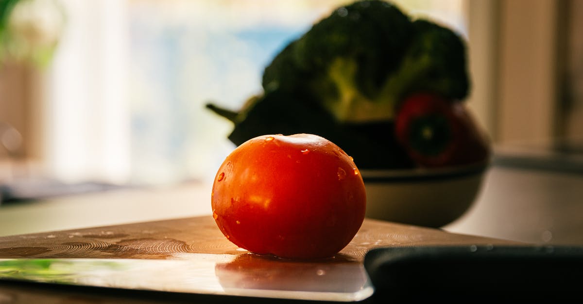 Turn Passata Into Tomato Paste? - Red Tomato on Brown Wooden Chopping Board Turn Passata Into Tomato Paste? - Red Tomato on Brown Wooden Chopping Board