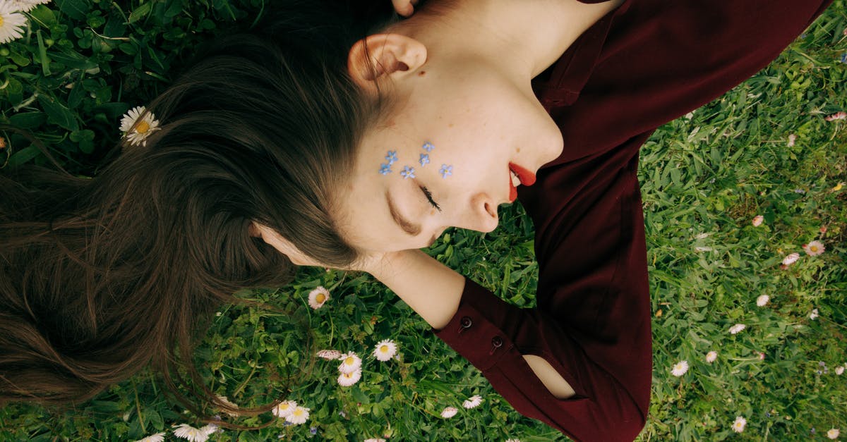 Turning focaccia upside down before topping - Woman in Red Long Sleeve Shirt Lying on White Flower Field Turning focaccia upside down before topping - Woman in Red Long Sleeve Shirt Lying on White Flower Field