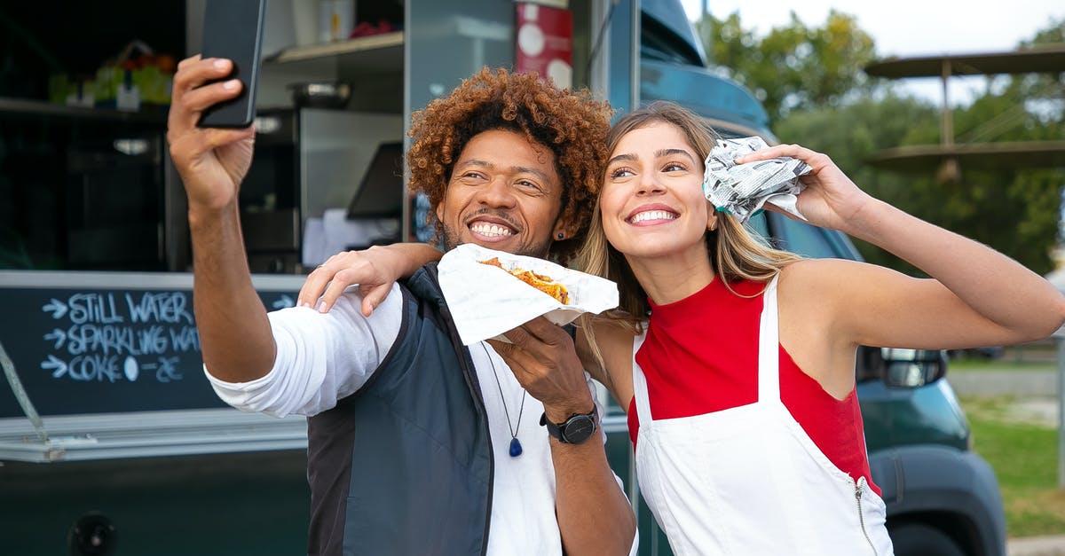 Uses for brewers/nutritional yeast? - Happy multiethnic friends with burgers taking selfie near food truck Uses for brewers/nutritional yeast? - Happy multiethnic friends with burgers taking selfie near food truck