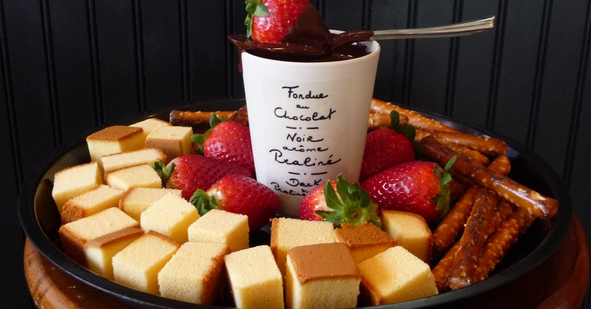 Uses for fondue broth? - White Ceramic Mug on Top Sppon and Strawberry Surrounded Leche Plan and Strawberry on Black Round Shape Tray Uses for fondue broth? - White Ceramic Mug on Top Sppon and Strawberry Surrounded Leche Plan and Strawberry on Black Round Shape Tray