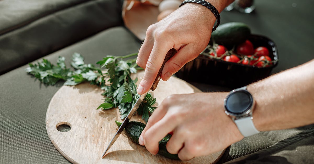 Uses of leftover vegetables from slow cooker - Person Holding Knife Slicing Vegetable Uses of leftover vegetables from slow cooker - Person Holding Knife Slicing Vegetable